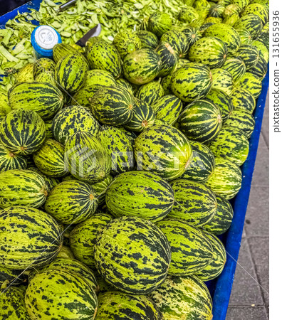 Fresh Green small Melons at Market 131655936