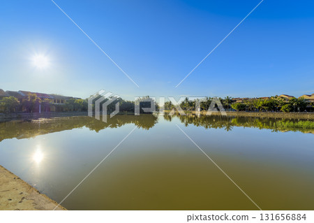 Thu Bon River flowing through the ancient town of Hoi An, Vietnam 131656884