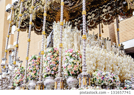 The Virgin of Health procession in the Holy Week procession in Seville, Andalusia, Spain The Virgin of Health procession in the Holy Week procession in Seville, Andalusia, Spain 131657741