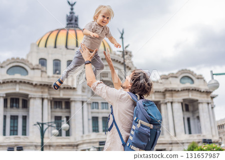 Father tourist lifting his little son in front of Palacio de Bellas Artes in Mexico City, enjoying family travel, playful bonding, and cultural exploration. Family vacation and tourism concept Father tourist lifting his little son in front of Palacio de Bellas Artes in Mexico City, enjoying family travel, playful bonding, and cultural exploration. Family vacation and tourism concept 131657987
