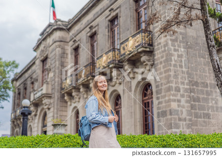 Young woman tourist standing near Chapultepec Castle in Mexico City, exploring the historic landmark. Solo travel, cultural heritage, tourism, and adventure concept Young woman tourist standing near Chapultepec Castle in Mexico City, exploring the historic landmark. Solo travel, cultural heritage, tourism, and adventure concept 131657995
