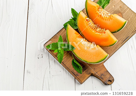 Fresh melon that stands out against a white background Fresh melon that stands out against a white background 131659228
