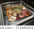 Mandarin Duck Hotpot Ingredients: Tofu, Duck Blood, Mushrooms, and Quail Eggs 131660203