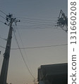 Street scene with electric poles and sky at sunset 131660208