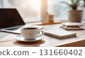 Modern minimalist workspace with laptop and coffee cup 131660402