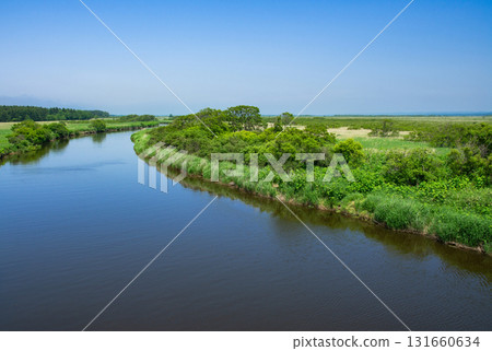 The Sarobetsu River flows through the Sarobetsu Plain 131660634