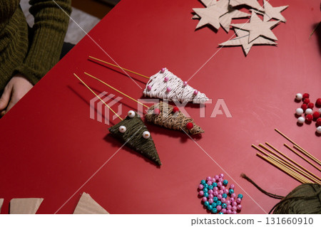 Christmas trees made of rope Sustainable Christmas preparation Diy process of making handmade decor. Step by step activity for children. Inclusive and responsible stress relief holiday hobby Christmas trees made of rope Sustainable Christmas preparation Diy process of making handmade decor. Step by step activity for children. Inclusive and responsible stress relief holiday hobby 131660910