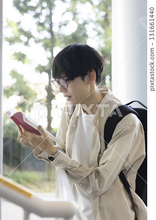 Student reading Student reading 131661440