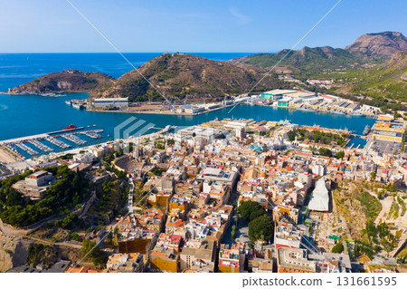 Aerial view of Cartagena by Mediterranean coast overlooking port and marina, Spain 131661595