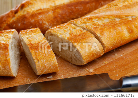 Closeup of appetizing fresh bread on wooden table 131661712