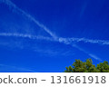 Intersecting airplane clouds 131661918