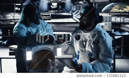 Researchers fly together in starship exploring Mars, expanding human presence in space Cosmonauts ensuring operational readiness before landing on red planet supporting future colonization Researchers fly together in starship exploring Mars, expanding human presence in space Cosmonauts ensuring operational readiness before landing on red planet supporting future colonization 131662122