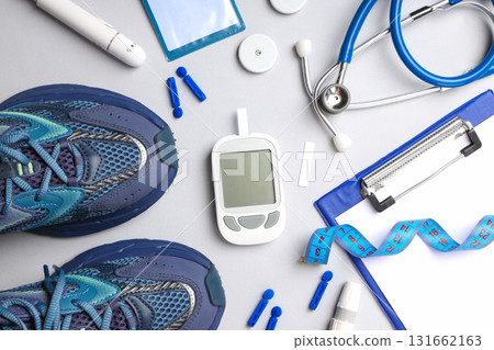 Sneakers and clipboard for diabetes management tools 131662163