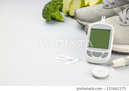 Glucose monitor by veggies and running shoes 131662175