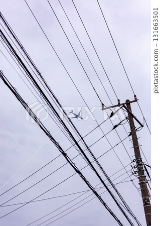 Electric wires and airplane Electric wires and airplane 131663501