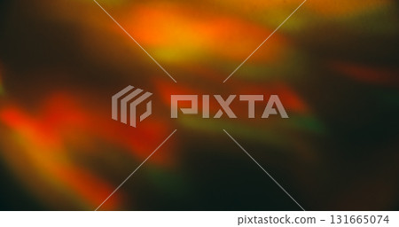 Defocused shiny flare. Gradient texture. Orange yellow pink color rainbow glare radiant glow on visual optical light art dark black background. 131665074