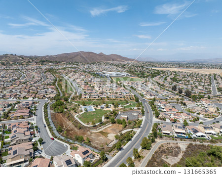 Aerial view of a sprawling neighborhood of family homes in Menifee, California, USA. 131665365