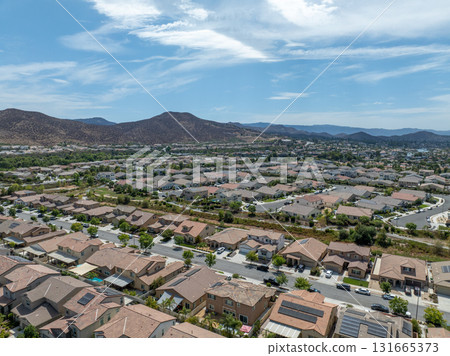 Aerial view of a sprawling neighborhood of family homes in Menifee, California, USA. 131665373