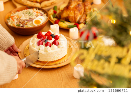 Family having a Christmas home party Family having a Christmas home party 131666711