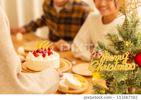 Family having a Christmas home party 131667302