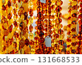 Amber Beads in a Street Shop. Orange Baltic Sea Souvenir, Natural Jewelry, Gold Brown Stone Necklace 131668533