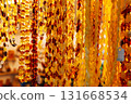 Amber Beads in a Street Shop. Orange Baltic Sea Souvenir, Natural Jewelry, Gold Brown Stone Necklace 131668534