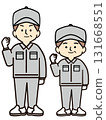 Middle-aged men and women in work clothes making a fist pump 131668551