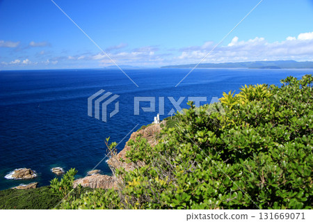 A lighthouse standing on a precipice A lighthouse standing on a precipice 131669071