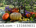 Vintage still life with pumpkins, flowers and decorations outside, thanksgiving day background, autumn calendar season concept Vintage still life with pumpkins, flowers and decorations outside, thanksgiving day background, autumn calendar season concept 131669831