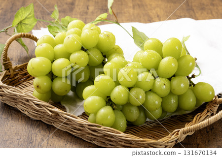 Fresh Shine Muscat grapes in a basket Fresh Shine Muscat grapes in a basket 131670134