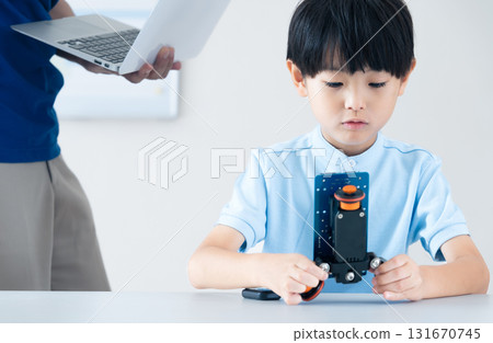 Boys studying at a programming school Boys studying at a programming school 131670745