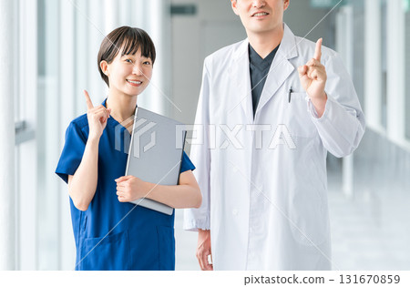 Medical workers in scrubs, medical staff, female nurses and male doctors in white coats 131670859