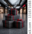 A stack of black gift boxes with a red ribbon against a festive shopping mall background. Perfect for holiday seasonal sales, gift shopping, shopping, e-commerce, Black Friday, Cyber Monday 131671088