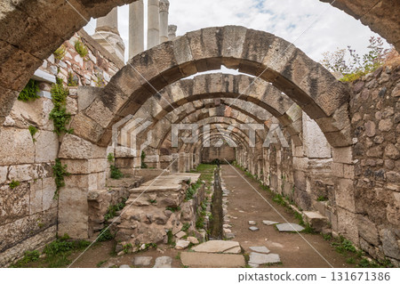 Preserved Roman stone archways and channel in Agora of Smyrna archaeological site Izmir Turkey 131671386