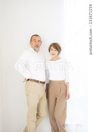 Smiling senior couple portrait 131671559