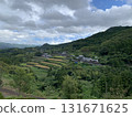 Rural villages and terraced fields in Kawauchi Town, Ehime Prefecture | A pristine Japanese landscape surrounded by lush mountains 131671625