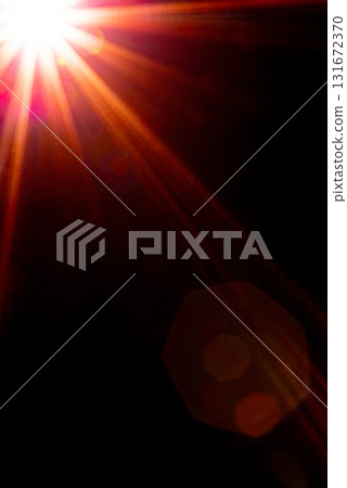 Blurred image Sun flare on the black background Blurred image Sun flare on the black background 131672370