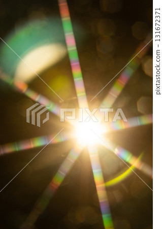 Abstract sun flare. The lens flare is subject to digital correction Abstract sun flare. The lens flare is subject to digital correction 131672371