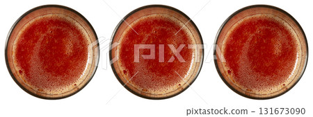 Tomato juice in glass isolated on white Tomato juice in glass isolated on white 131673090
