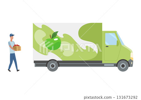 A truck driver loads boxes of apple juice into a truck. A man holds a basket of apples by a green delivery truck A truck driver loads boxes of apple juice into a truck. A man holds a basket of apples by a green delivery truck 131673292