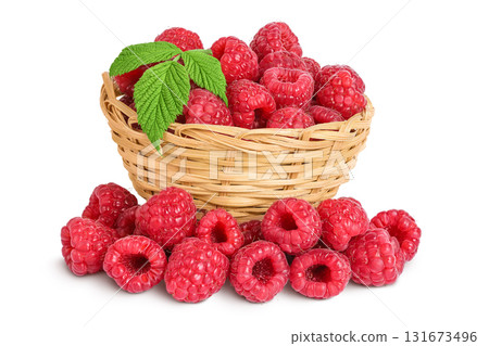 Ripe raspberries in wicker basket isolated on a white background Ripe raspberries in wicker basket isolated on a white background 131673496