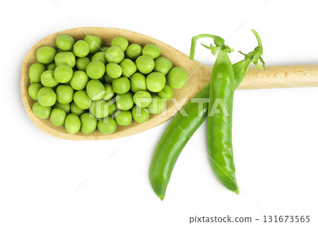Fresh green peas in wooden spoon isolated on white background. Top view. Flat lay Fresh green peas in wooden spoon isolated on white background. Top view. Flat lay 131673565