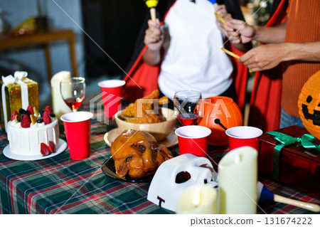 People having fun at Halloween party People having fun at Halloween party 131674222