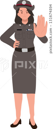 a female police officer in brown uniform making a stop hand gesture during traffic control a female police officer in brown uniform making a stop hand gesture during traffic control 131674894