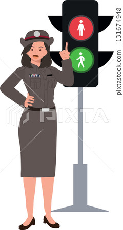 female police officer managing traffic with pedestrian signal for road safety. female police officer managing traffic with pedestrian signal for road safety. 131674948