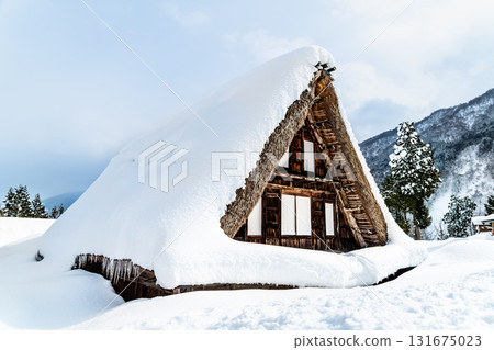 Snow-covered houses in Ainokura Gassho-style village in Gokayama 131675023