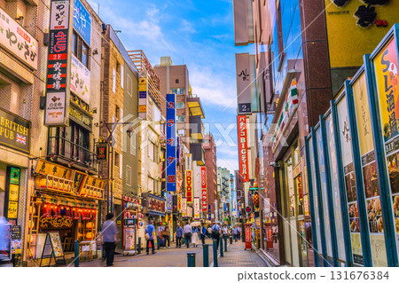 Tokyo cityscape in Japan, including a view of the bars in front of Shinbashi SL Square (October 2nd) Tokyo cityscape in Japan, including a view of the bars in front of Shinbashi SL Square (October 2nd) 131676384