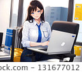 A cheerful woman working at her desk with a smile 131677012
