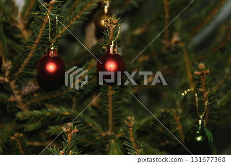 Beautiful Christmas defocused blurred background with Christmas tree lights in the evening. Festive New Year's mood, flash photography, retro modern style Beautiful Christmas defocused blurred background with Christmas tree lights in the evening. Festive New Year's mood, flash photography, retro modern style 131677368
