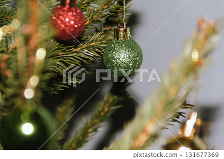 Beautiful Christmas defocused blurred background with Christmas tree lights in the evening. Festive New Year's mood, flash photography, retro modern style Beautiful Christmas defocused blurred background with Christmas tree lights in the evening. Festive New Year's mood, flash photography, retro modern style 131677369